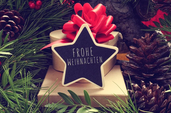 Star-shaped chalkboard with the text Frohe Weihnachten — Stock Photo, Image