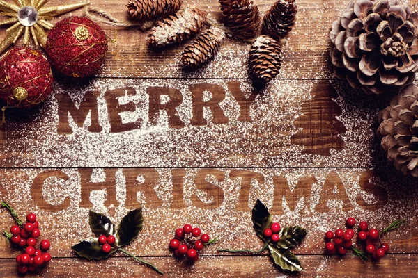 Ornamente und Text frohe Weihnachten lizenzfreie Stockbilder