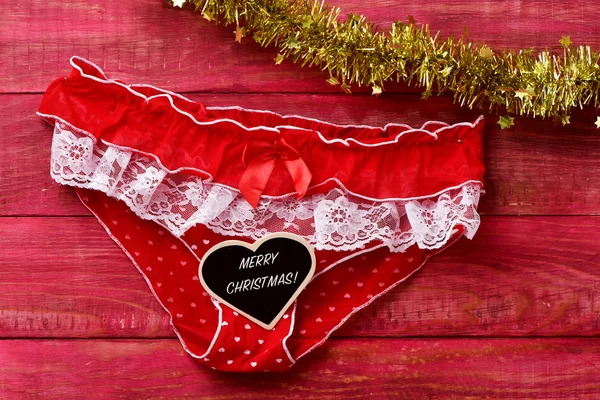 Red panties and text merry christmas — Stock Photo, Image