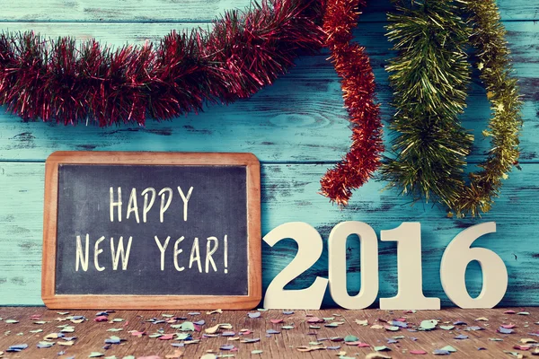 Konfetti, Lametta und Text frohes neues Jahr 2016 — Stockfoto