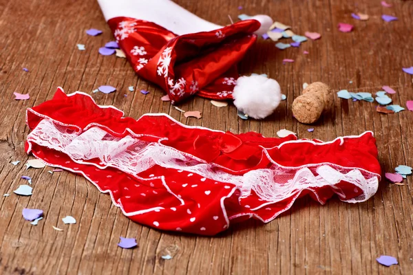 Santa hat, červené kalhotky a konfety — Stock fotografie