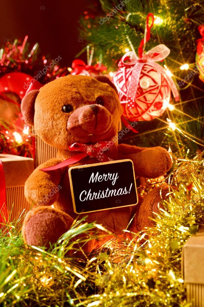 Text merry Christmas teddy bear and gifts Stock Photo by nito103