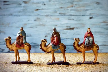 the three kings in their camels clipart