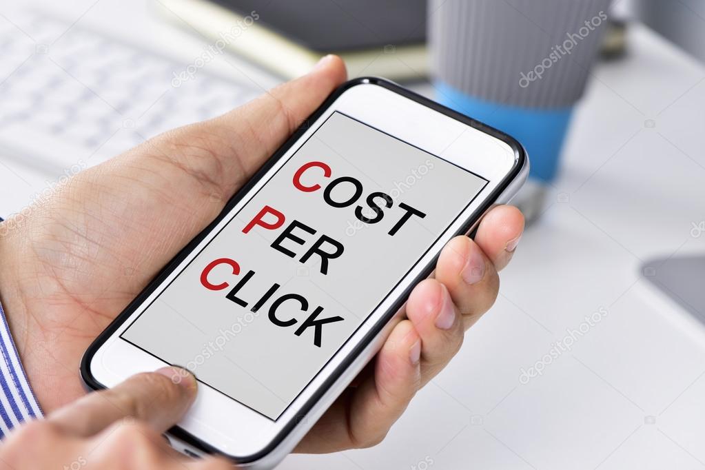 businessman with a smartphone with the text cost per click