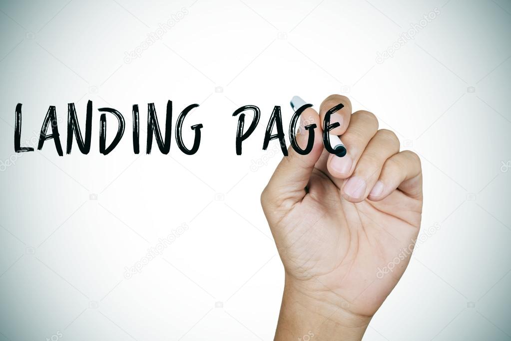 man writing the text landing page