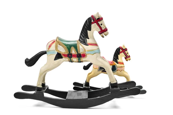 Gammal leksak hästar på en vit bakgrund — Stockfoto