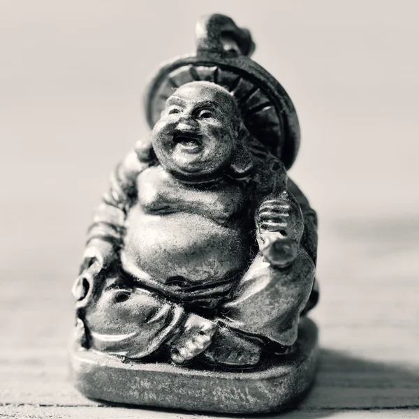 Un buddha riendo en duotono — Foto de Stock