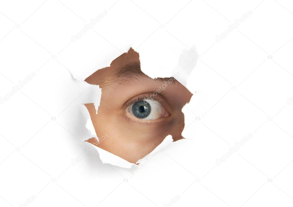 Eye looking through a hole
