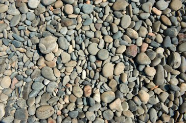 Yuvarlak deniz taşları Rackground.