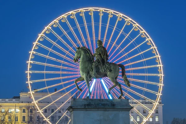 Place Bellecour, famous statue of King Louis XIV and the wheel — Stock Photo, Image