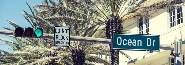 Panoramic view of Ocean Drive street sign — Stock Photo, Image
