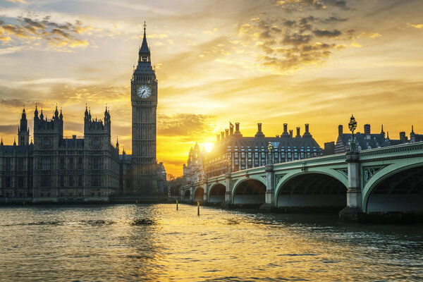 Famous Big Ben clock tower in London at sunset, UK.