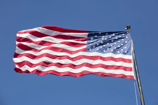 American flag on the blue sky — Stock Photo, Image