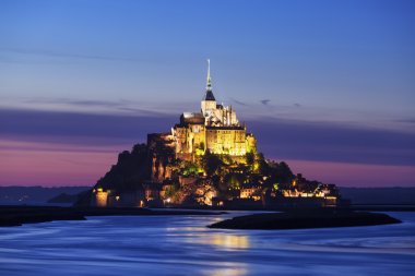 View of Mont-Saint-Michel by night clipart