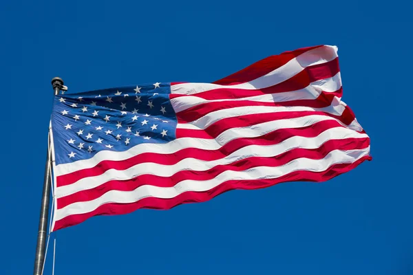 American flag on the blue sky — Stock Photo, Image