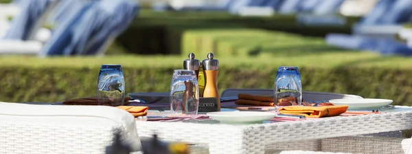 Crop of restaurant table on resort — Stock Photo, Image