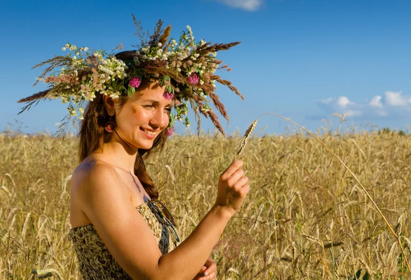 Girl with a wreath on his head Royalty Free Stock Images