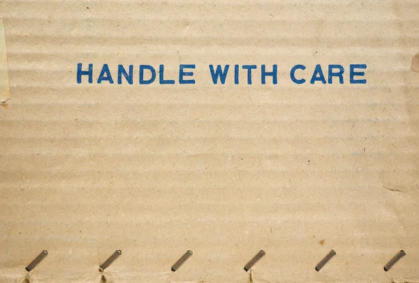 Handle with care — Stock Photo, Image