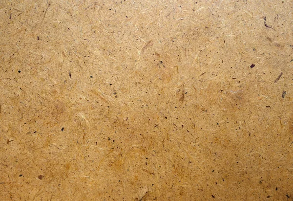 Brown pressed cardboard background — Stock Photo, Image