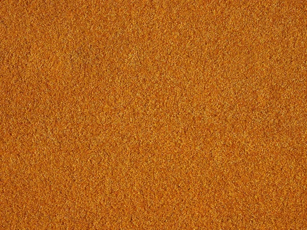 Cesped pasto artificial sintetico naranja fondo — Foto de Stock