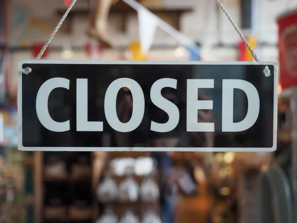 Closed sign on a shop window — Stock Photo, Image