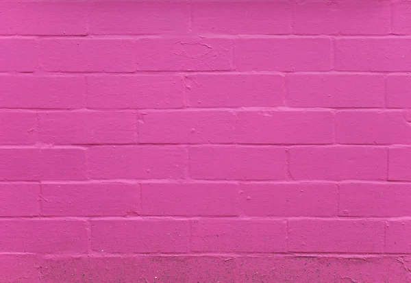 Růžová cihlová zeď pozadí — Stock fotografie