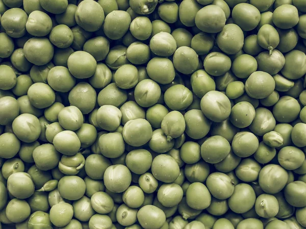 Zelený hrášek ročník zeleniny pozadí desaturated — Stock fotografie