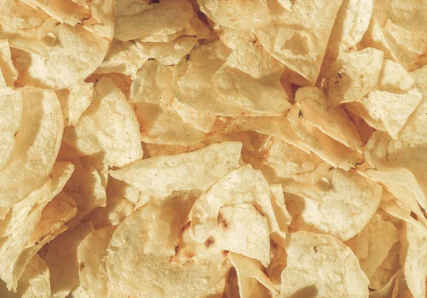 Potatischips chips vintage desaturated — Stockfoto