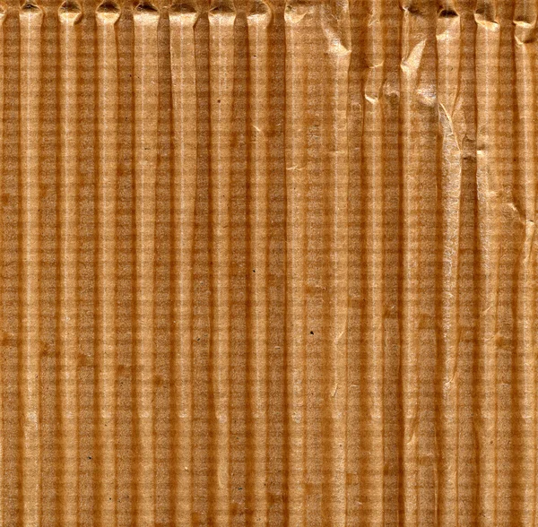 Hintergrund aus braunem Wellpappe — Stockfoto