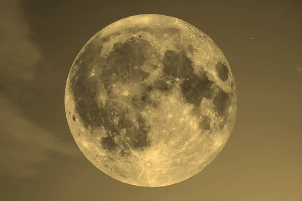 Full moon over blue sky sepia — Stock Photo, Image