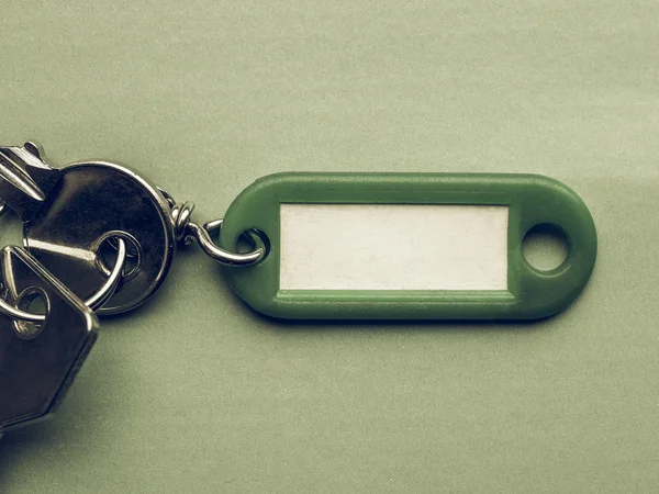 Vintage looking Green keyring — Stock Photo, Image