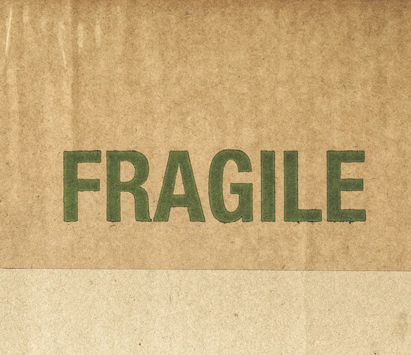 Vintage looking Fragile corrugated cardboard — Stock Photo, Image