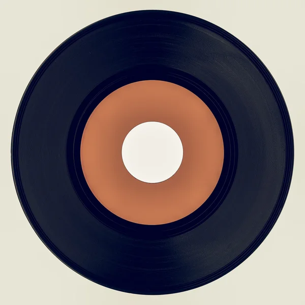 Vintage procurando disco de vinil com rótulo laranja — Fotografia de Stock