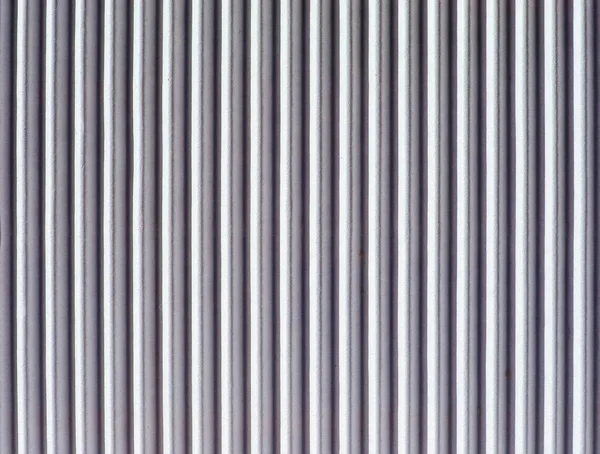 white corrugated cardboard texture useful as a background