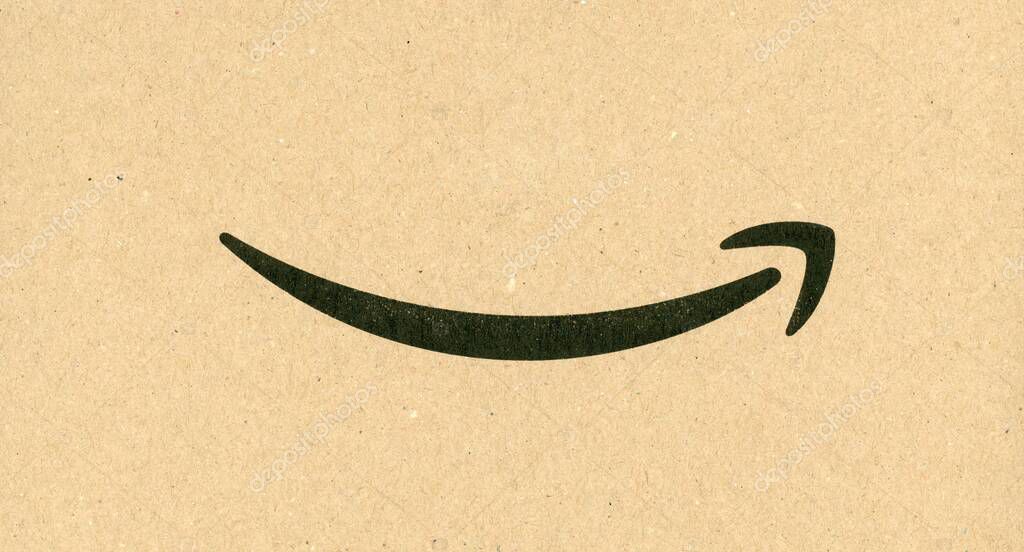 SEATTLE, USA - CIRCA DECEMBER 2020: Amazon sign on corrugated cardboard packet