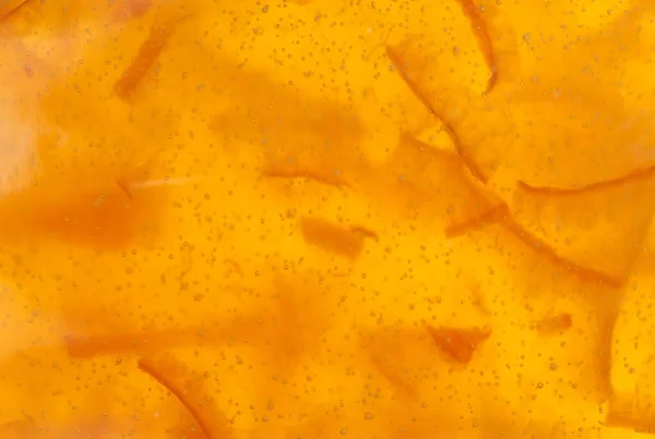 背景として役に立つオレンジとみかんのマーマレードの質感 — ストック写真