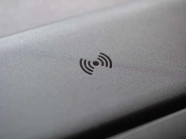 RFID radio frequency identification symbol for NFC near field communication on a card reader device