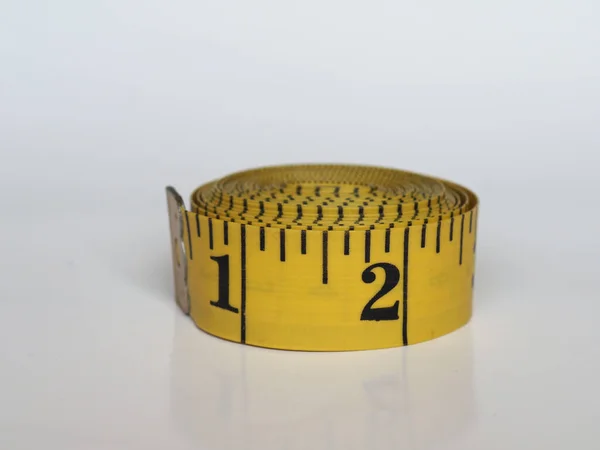 帝国単位でカスタマイズするためのテープフレキシブル定規リボンの測定 — ストック写真