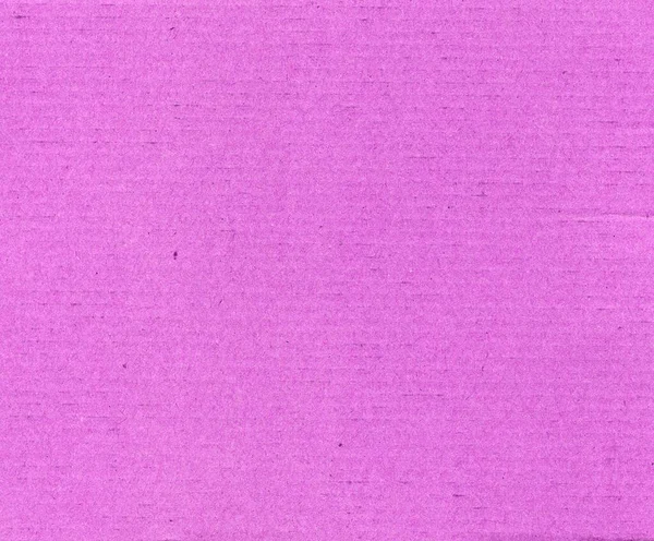 背景として役に立つピンクの段ボールの質感 — ストック写真