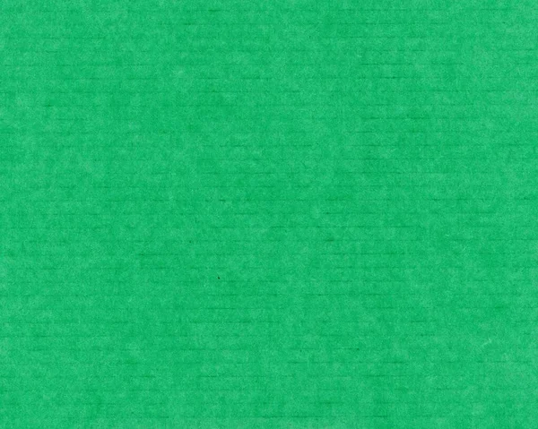 背景として役に立つ濃い緑色の段ボールの質感 — ストック写真