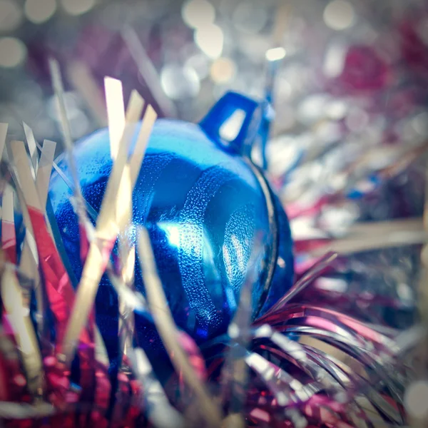 Retro look Bauble and tinsel — Stock Photo, Image