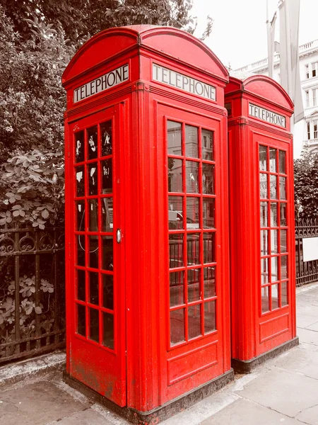 Retro look London telephone box Stock Picture