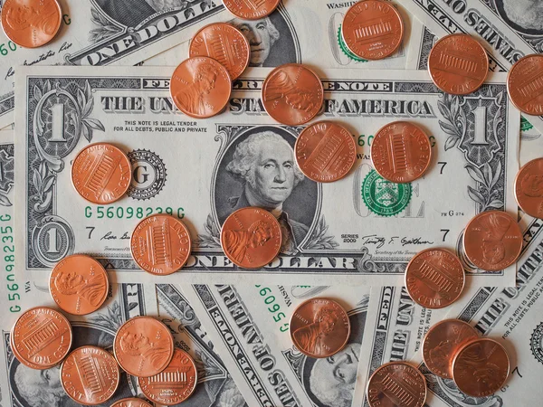 Moedas e notas em dólares — Fotografia de Stock