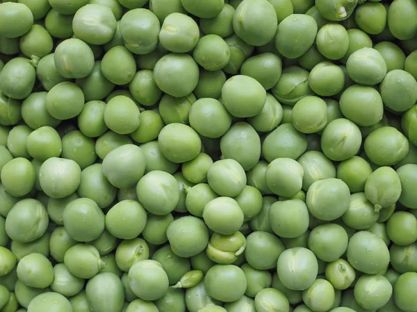 Groene erwten plantaardige achtergrond — Stockfoto