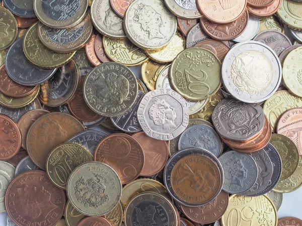 Monedas en euros y libras —  Fotos de Stock