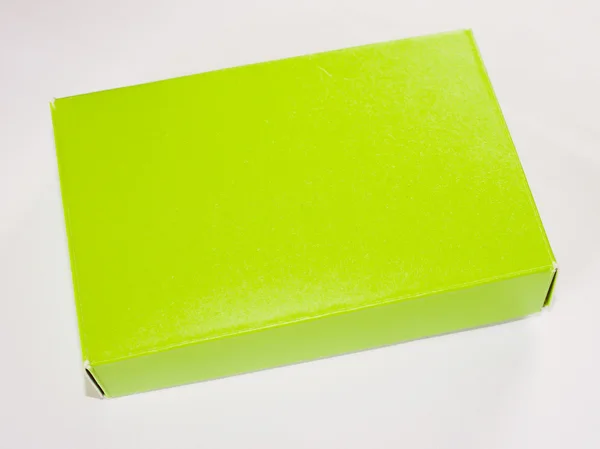Retro se zelená žlutá papírová krabice — Stock fotografie