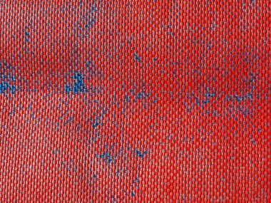 industrial style red plastic texture useful as a background