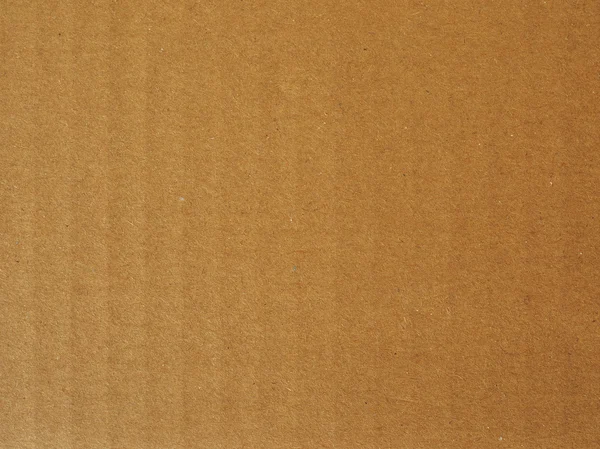Kahverengi kıvrımlı karton arkaplan — Stok fotoğraf
