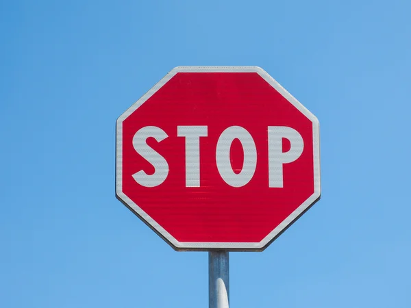 Stop sign over blue sky Royalty Free Stock Photos