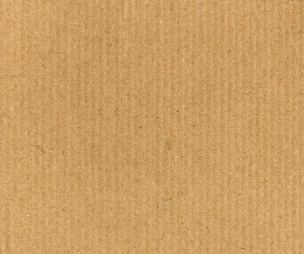Коричневий гофрований картонний фон — стокове фото